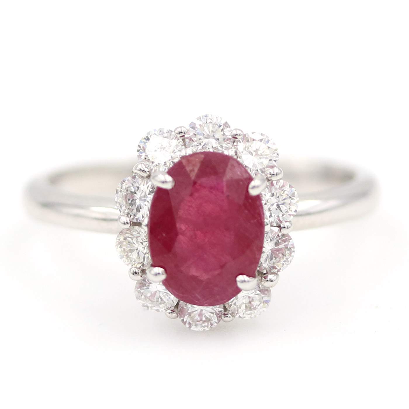 Oval Ruby And Diamond Halo Ring