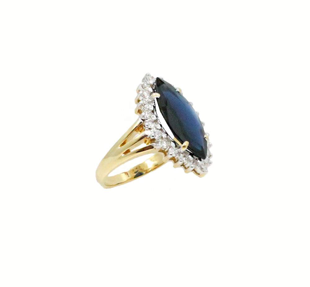 4.10 CTW SAPPHIRE AND DIAMOND RING