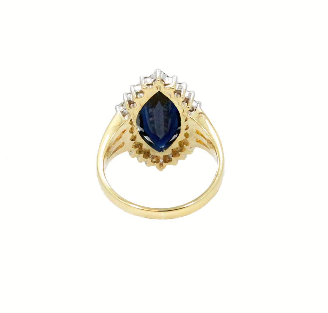 4.10 CTW SAPPHIRE AND DIAMOND RING