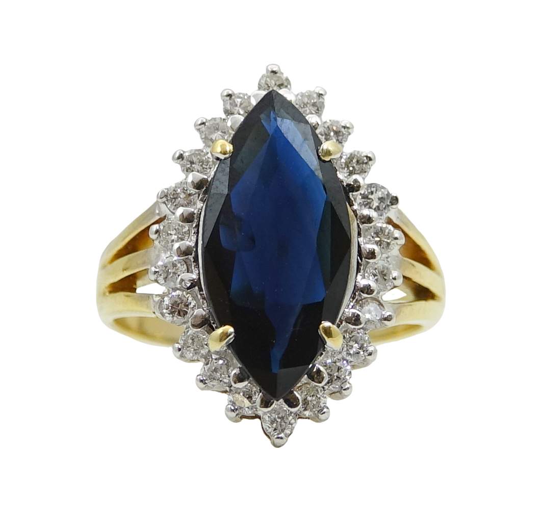 4.10 CTW SAPPHIRE AND DIAMOND RING