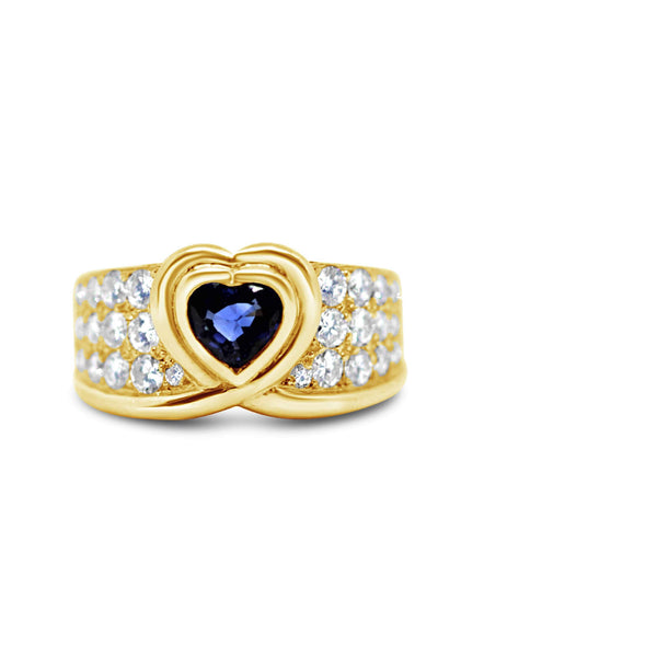 18KT YELLOW GOLD FRED PARIS SAPPHIRE AND DIAMOND RING.