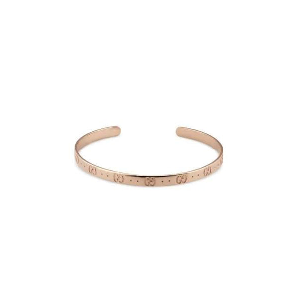 18KT GOLD GUCCI ICON CUFF BRACELET.