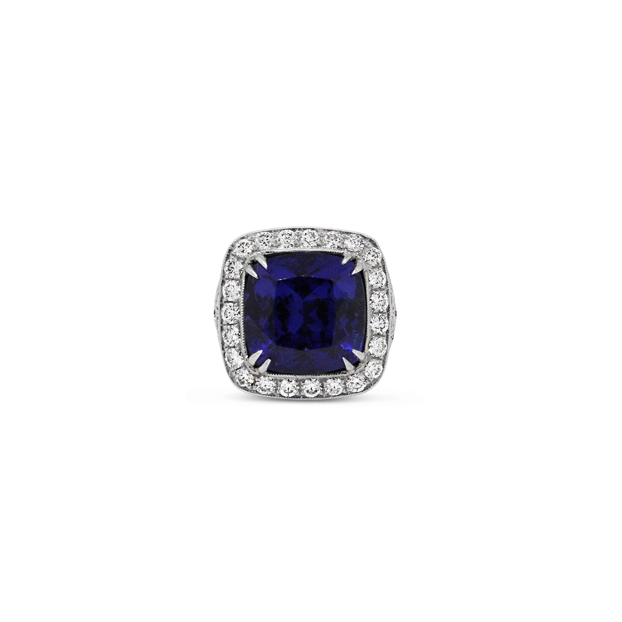 PLATINUM TANZANITE AND DIAMOND RING.