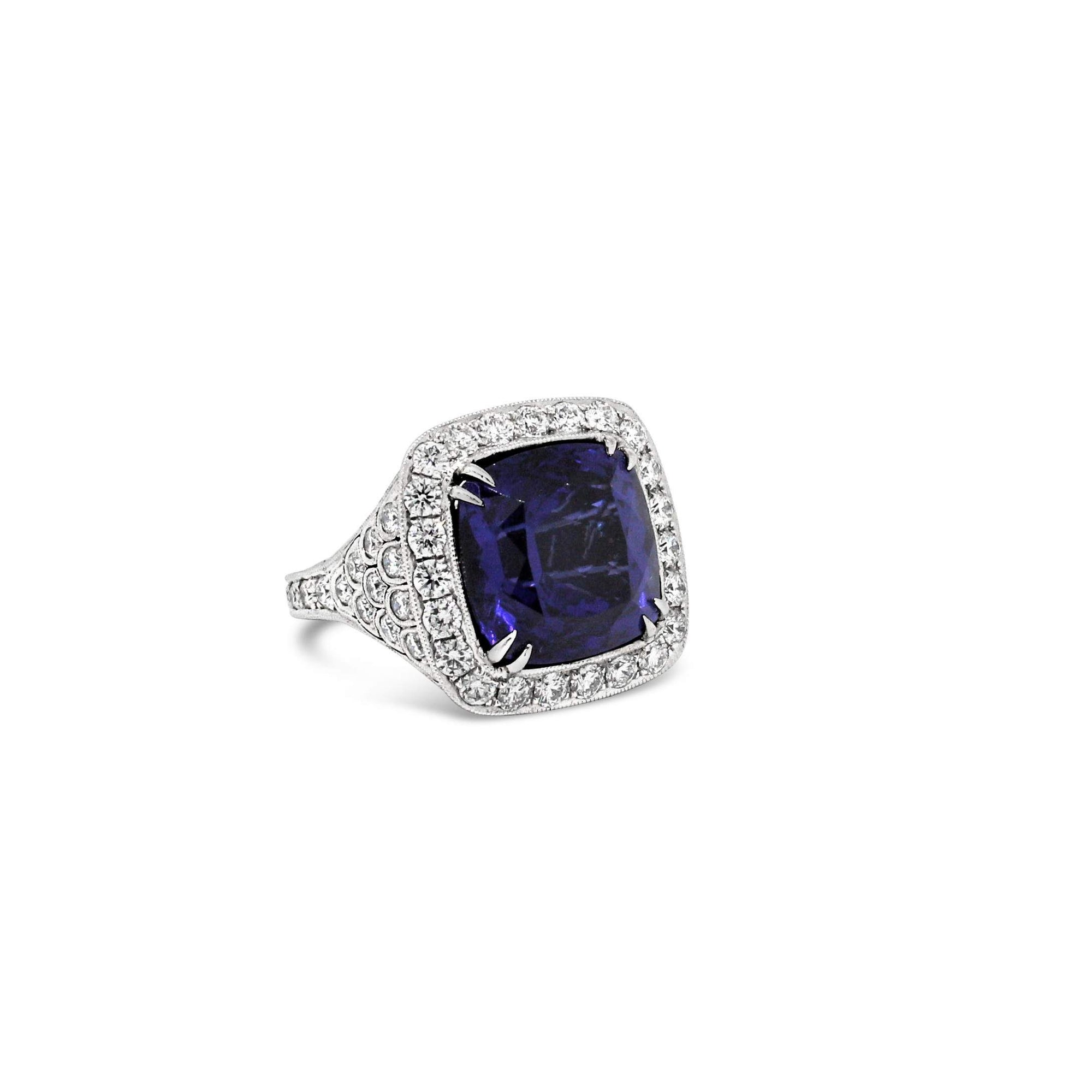 PLATINUM TANZANITE AND DIAMOND RING.