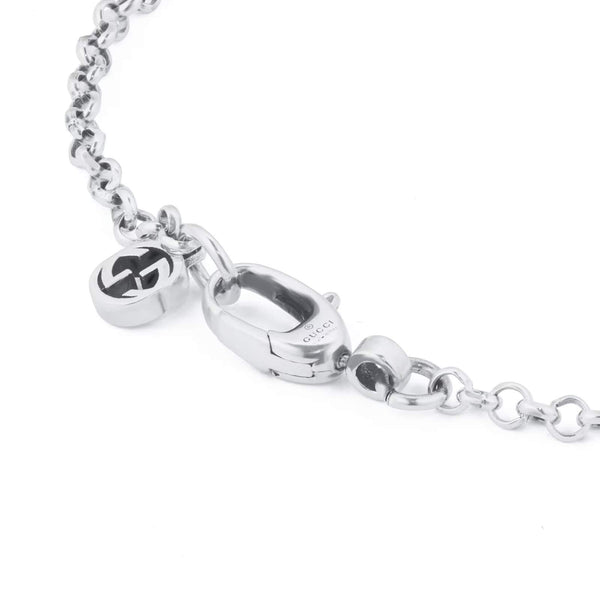 STERLING SILVER GUCCI KEY BRACELET.