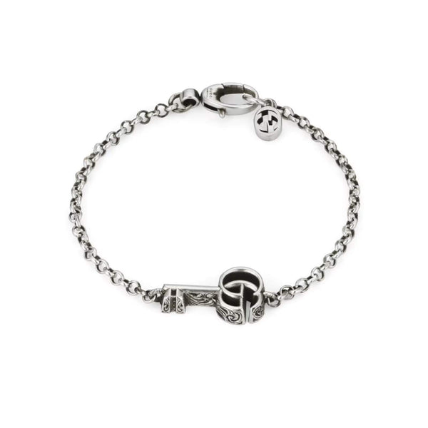 STERLING SILVER GUCCI KEY BRACELET.