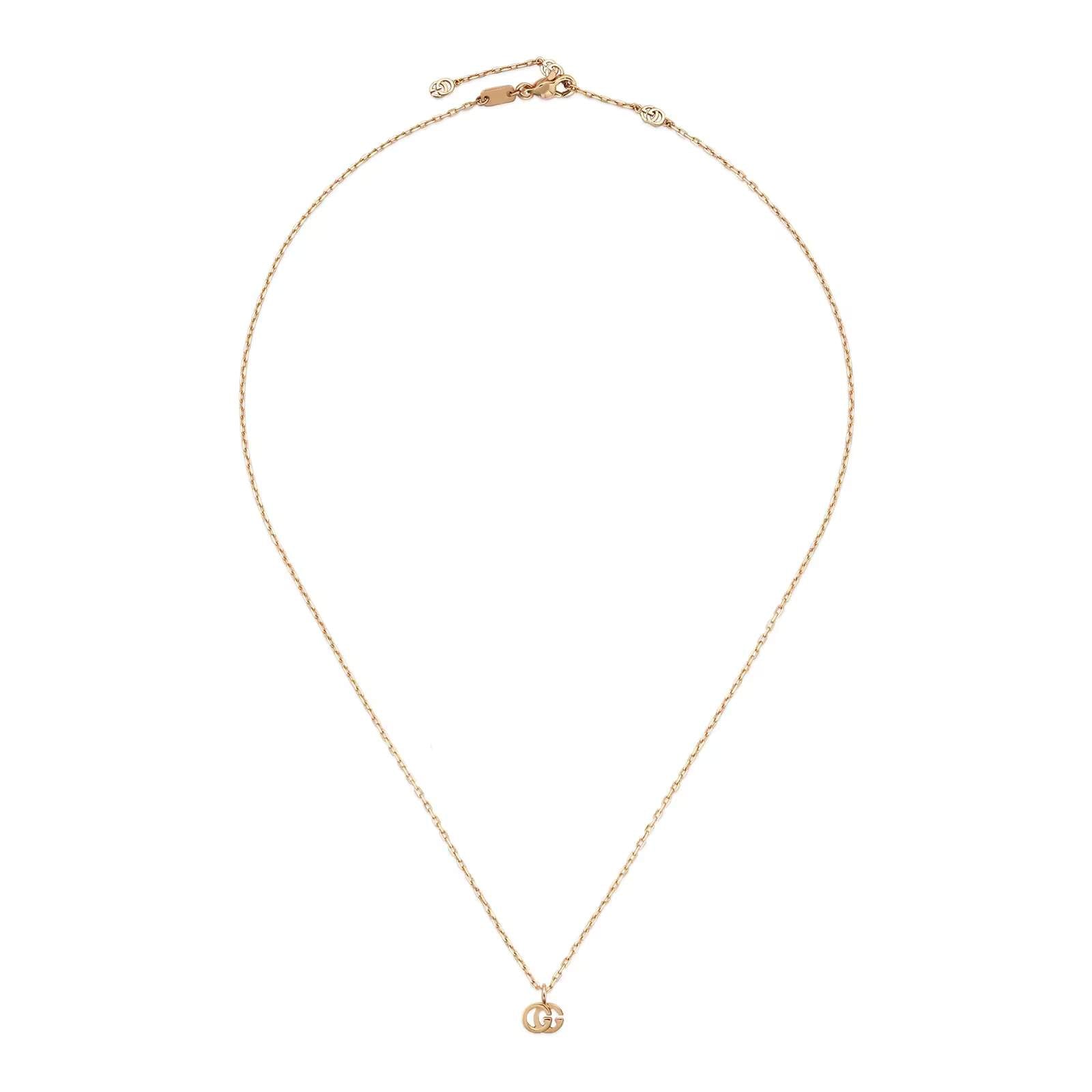 18KT GOLD GUCCI "G"NECKLACE.