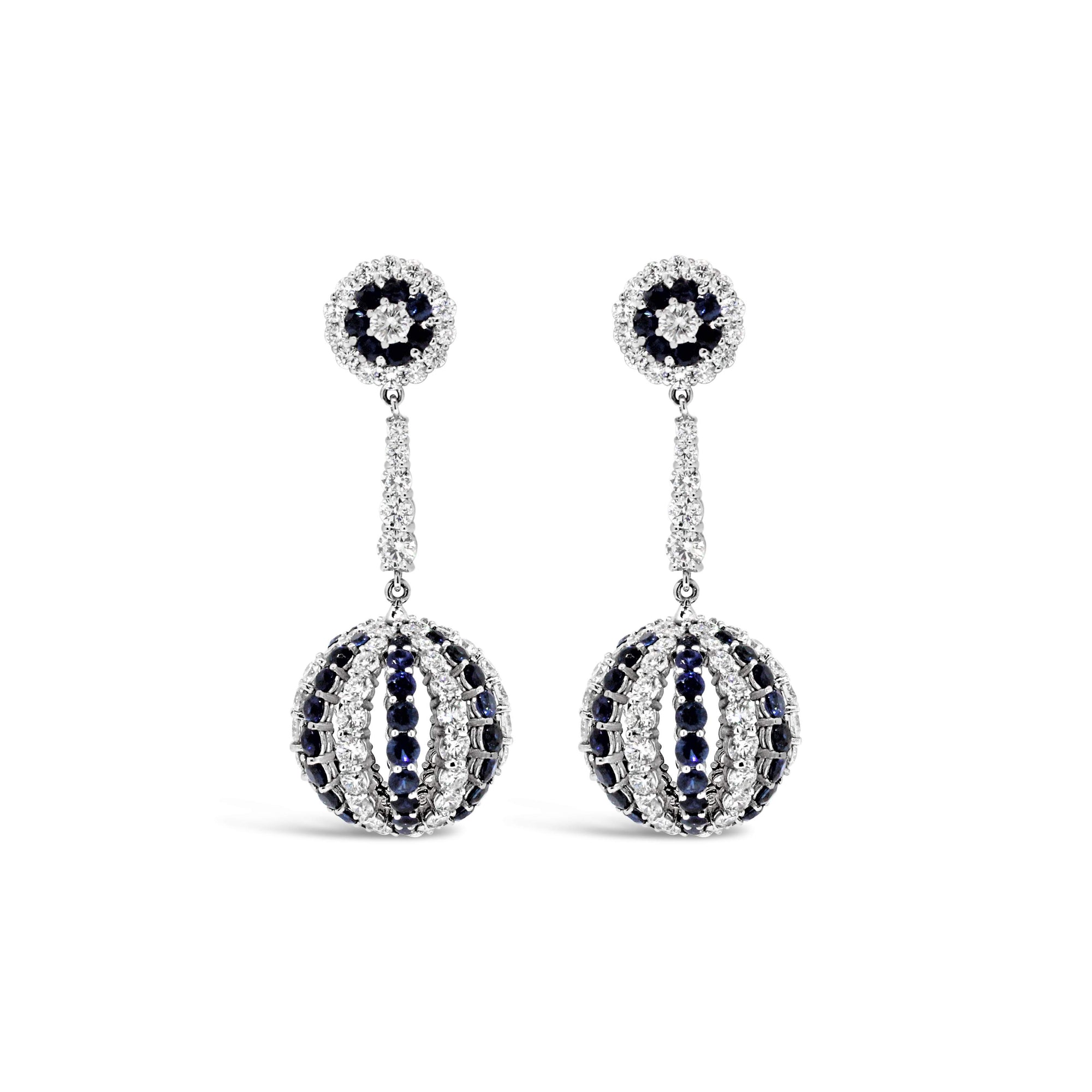 18KT WHITE GOLD SAPPHIRE & DIAMOND DANGLE EARRINGS.