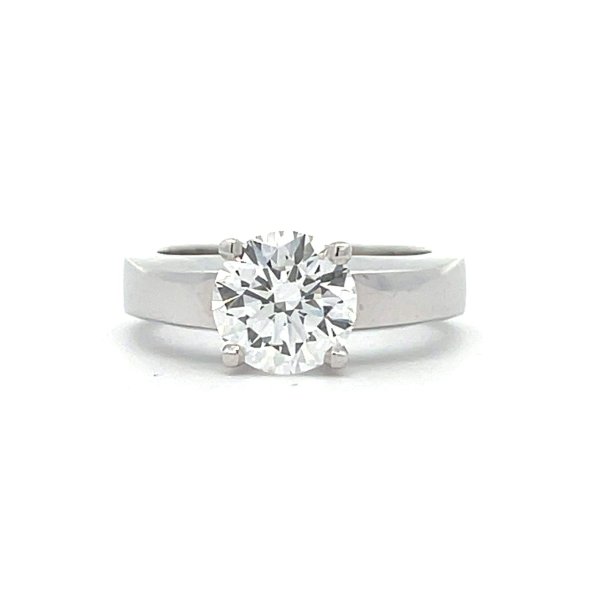 CARTIER ROUND DIAMOND ENGAGEMENT RING