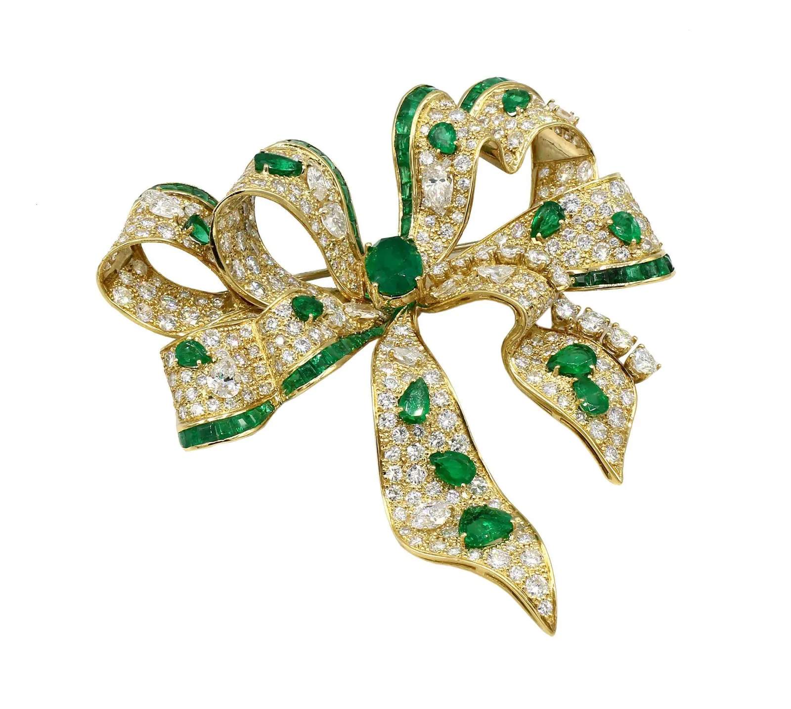 SABBADINI EMERALD AND DIAMOND BOW BROOCH